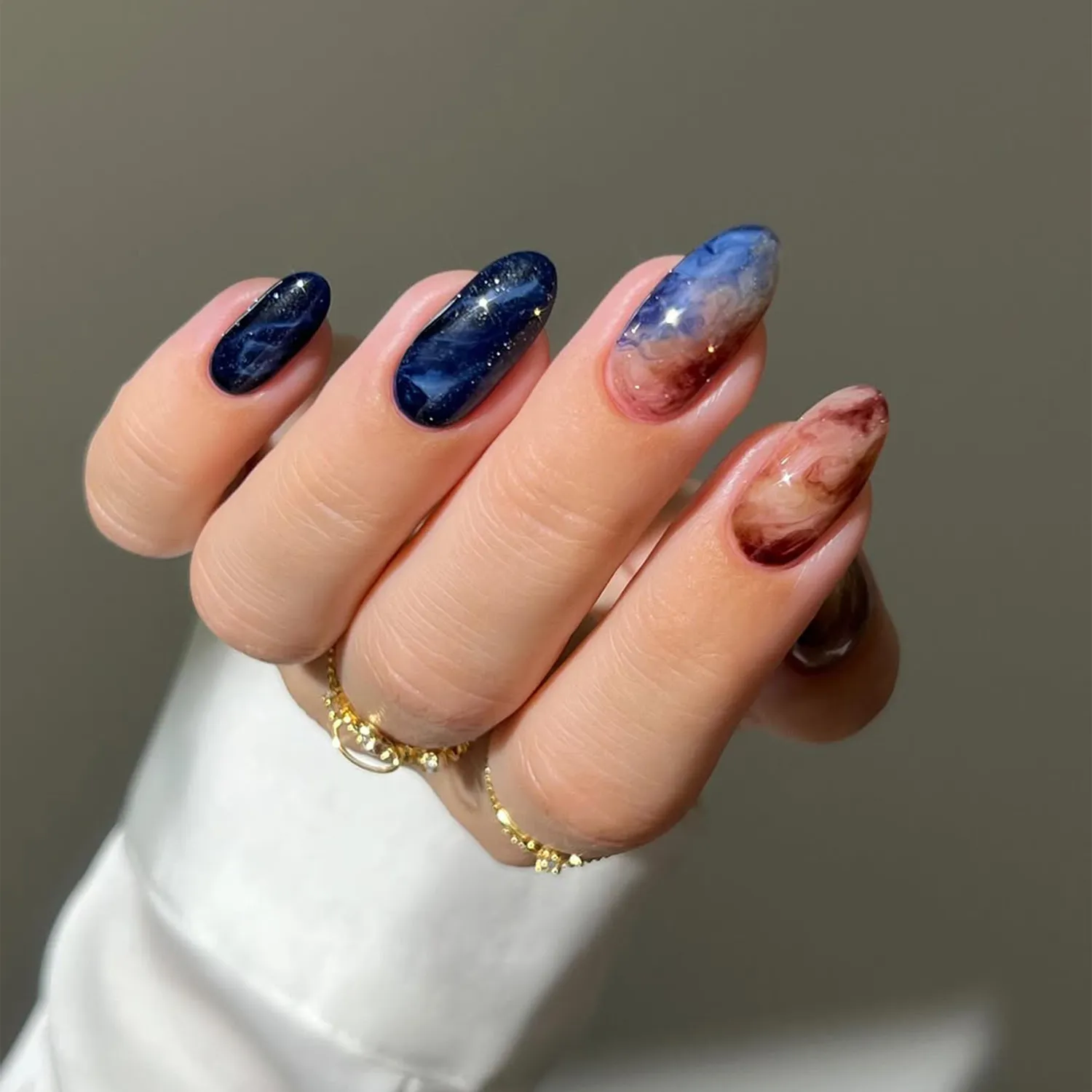 طراحی ناخن آبی قهوه ای